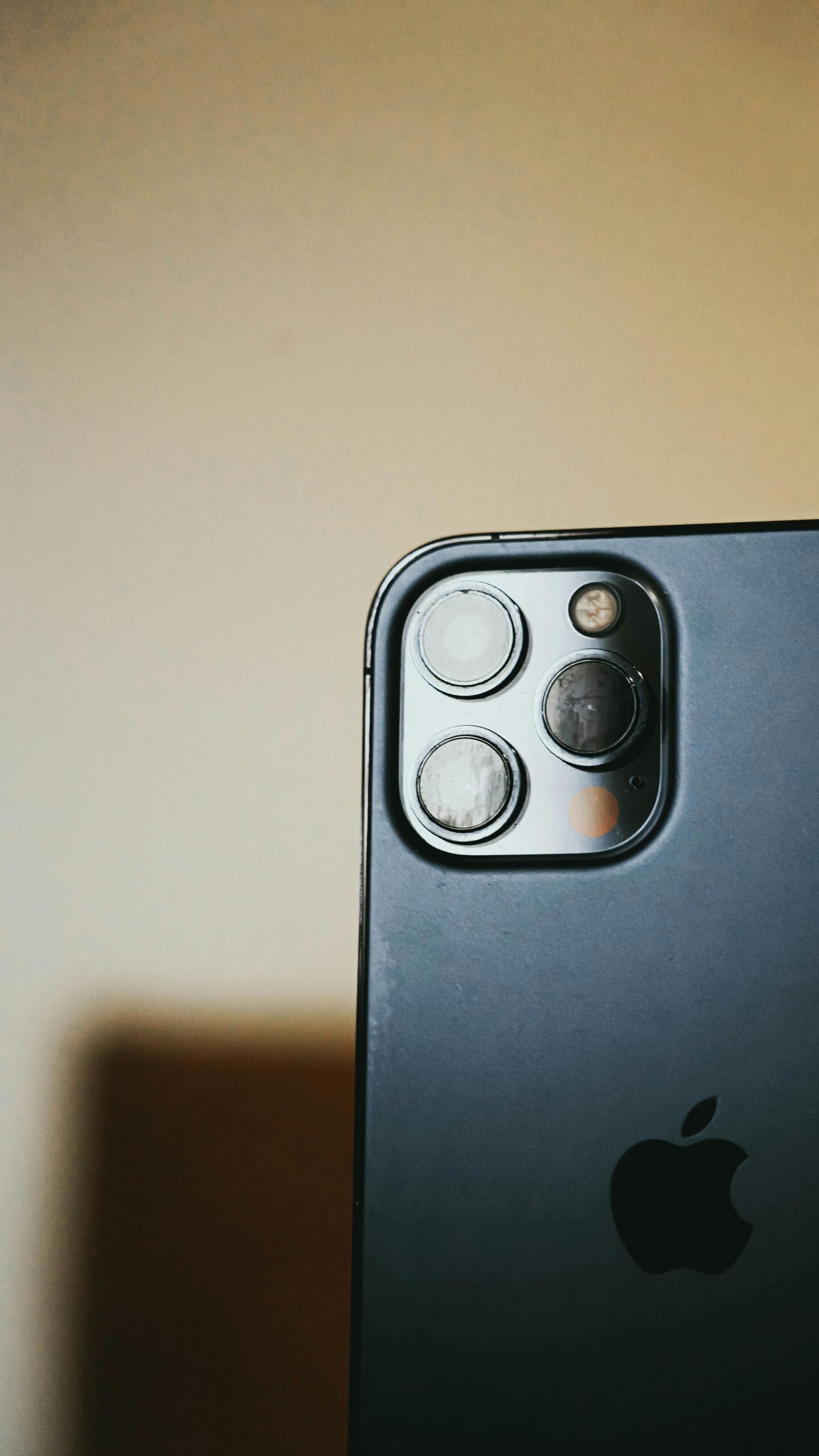 Detailed close-up of smartphone lenses, capturing sleek design and technology.